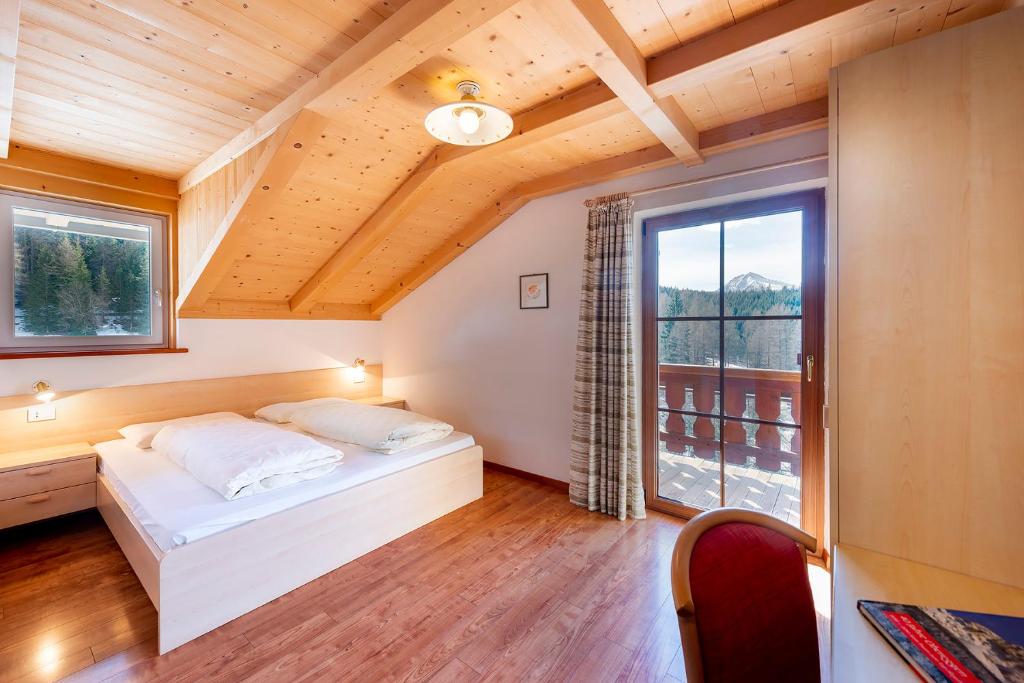 Postel nebo postele na pokoji v ubytování Gasthof Specker