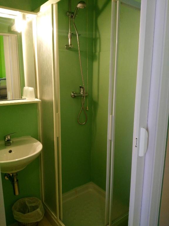 Koupelna v ubytování Hotel Simon