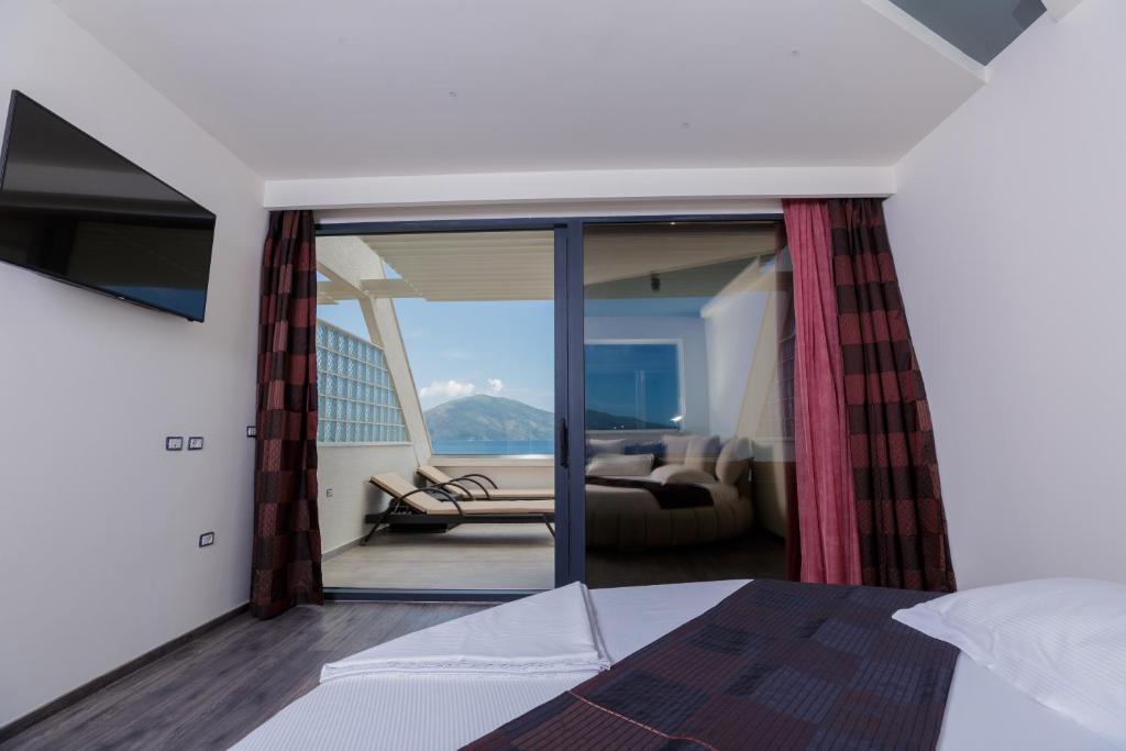 TV a/nebo společenská místnost v ubytování Hotel Picasso