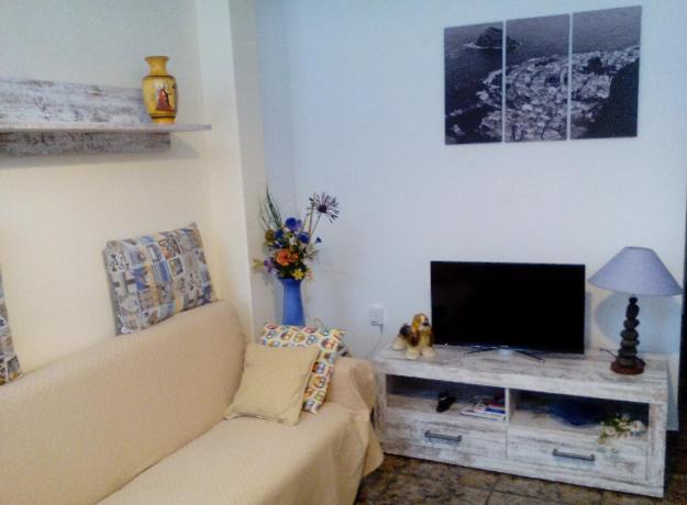 TV i/ili multimedijalni sistem u objektu A cozy flat in the heart of El Fraile