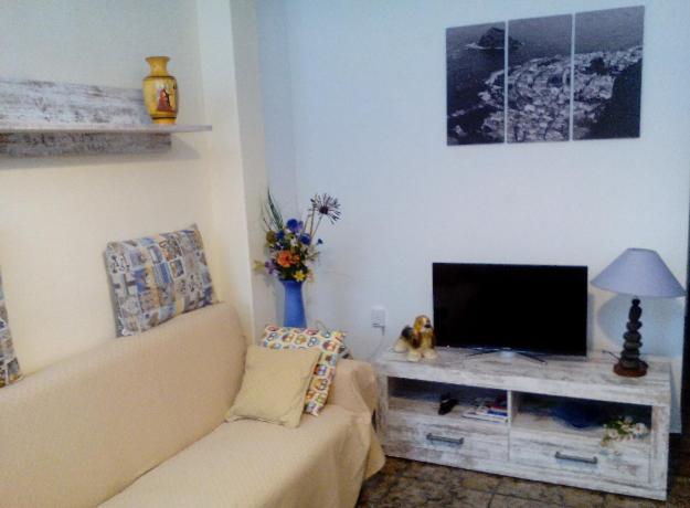 Μια τηλεόραση ή/και κέντρο ψυχαγωγίας στο A cozy flat in the heart of El Fraile plus optional car rental
