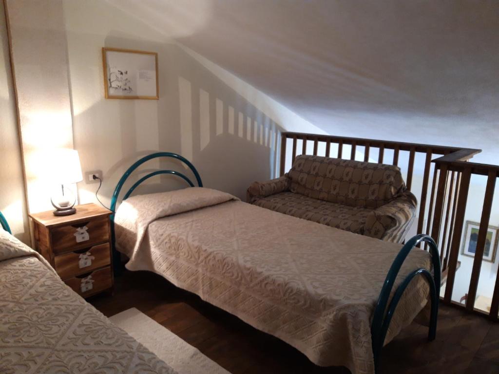 Postel nebo postele na pokoji v ubytování Hotel Valle del Cedrino