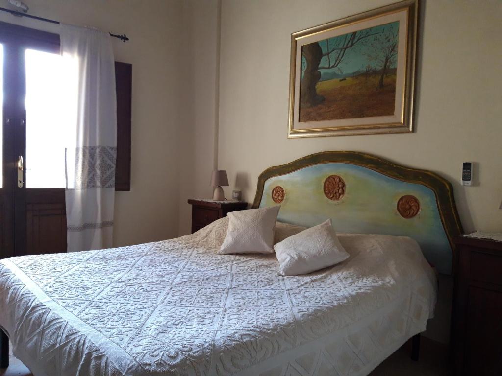 Postel nebo postele na pokoji v ubytování Hotel Valle del Cedrino
