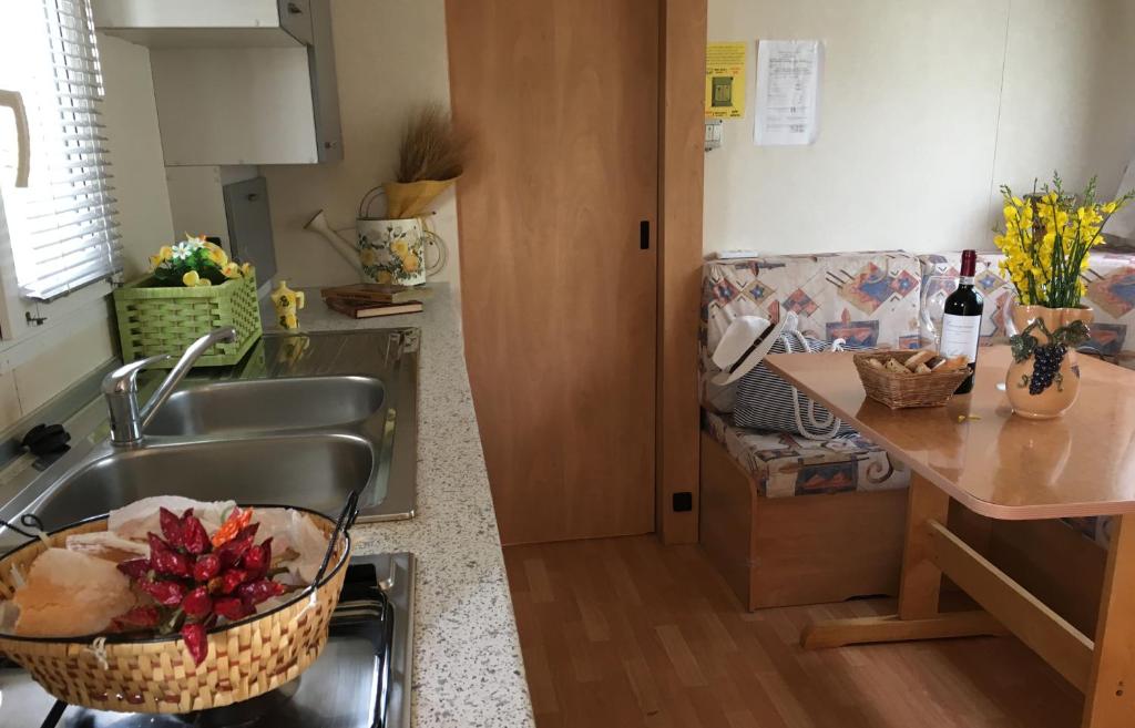 Kuchyň nebo kuchyňský kout v ubytování Camping San Giusto