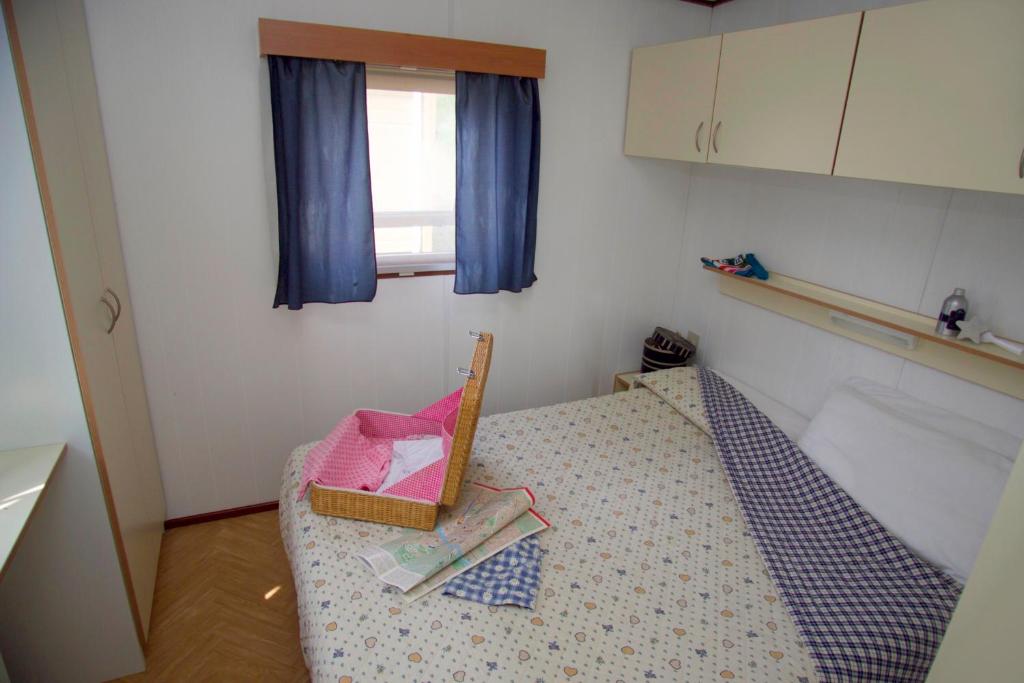 Postel nebo postele na pokoji v ubytování Camping San Giusto