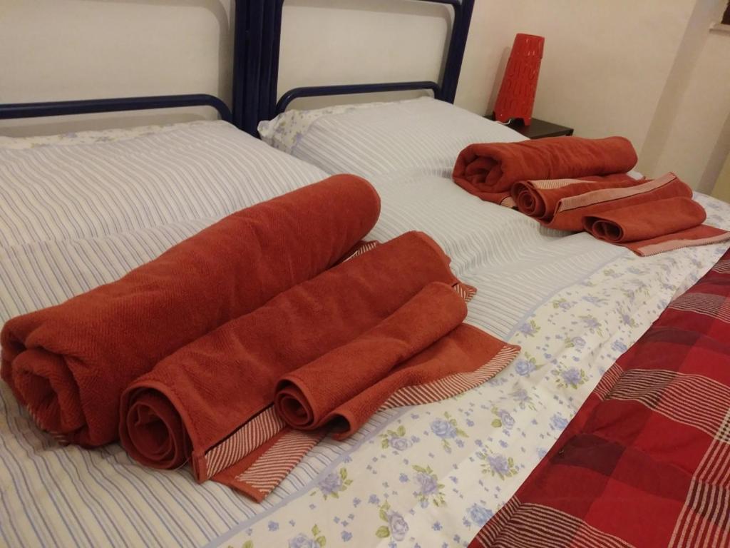 Postel nebo postele na pokoji v ubytování Fattoria Nonno Neno B&B