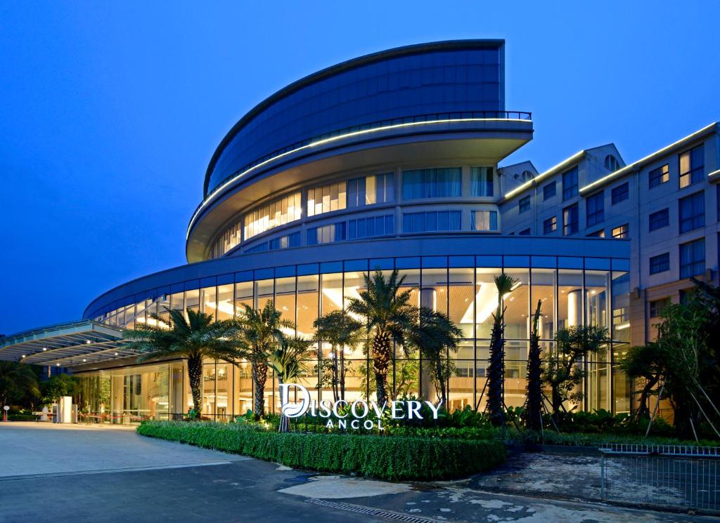 a building with a sign on the side of it at Discovery Ancol in Jakarta