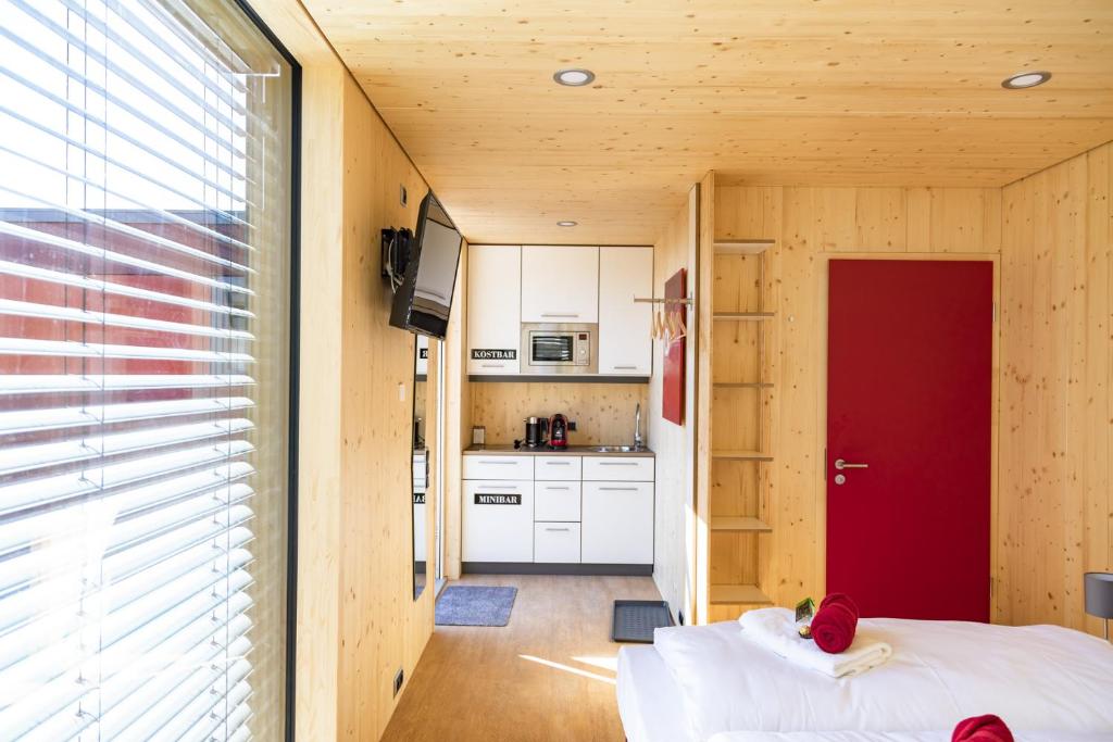 Postel nebo postele na pokoji v ubytování kleinHOTEL Steinau-Rabenstein GbR
