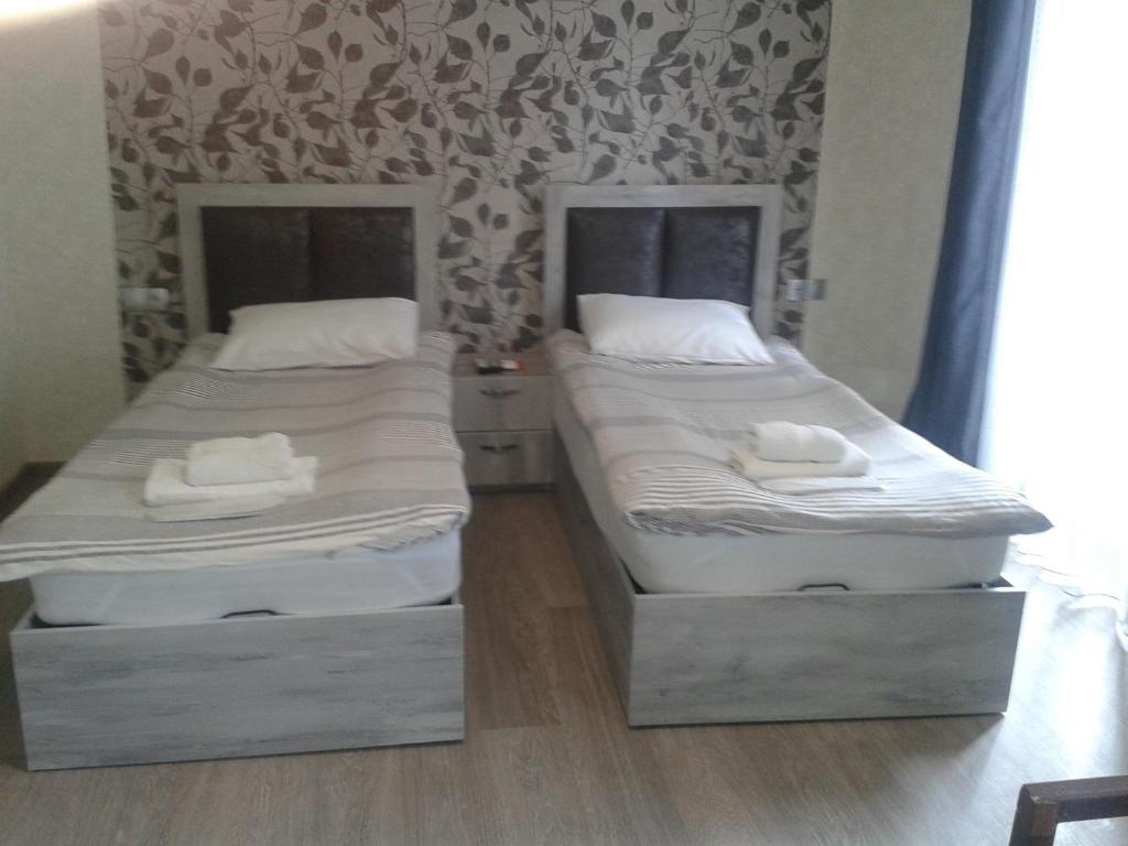 Postel nebo postele na pokoji v ubytování Guest house UTA