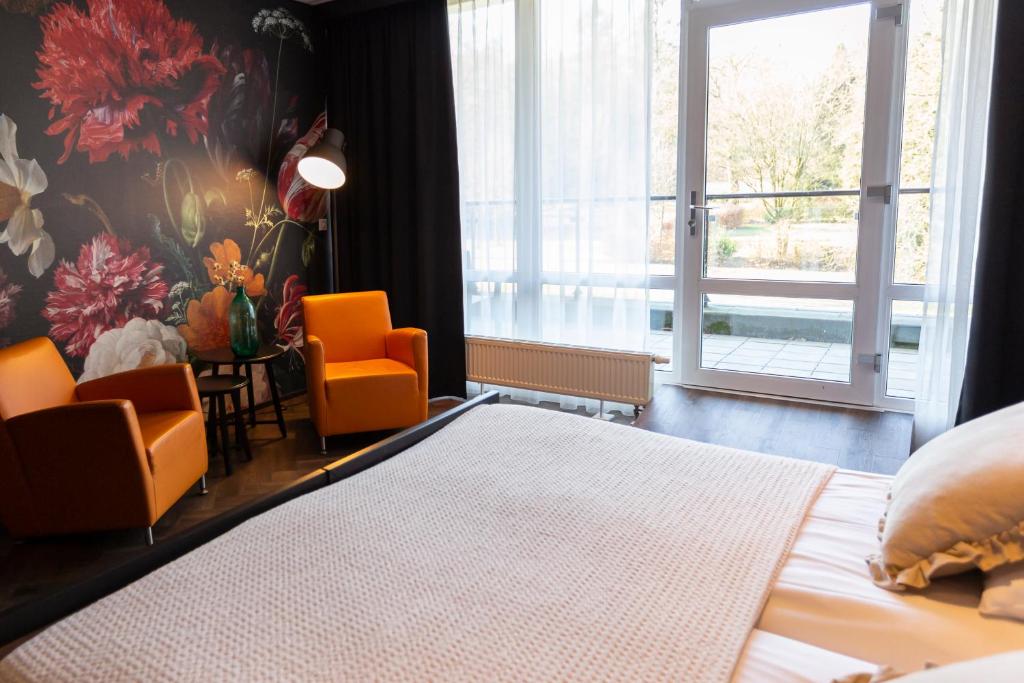 Postel nebo postele na pokoji v ubytování Hotel Spelderholt