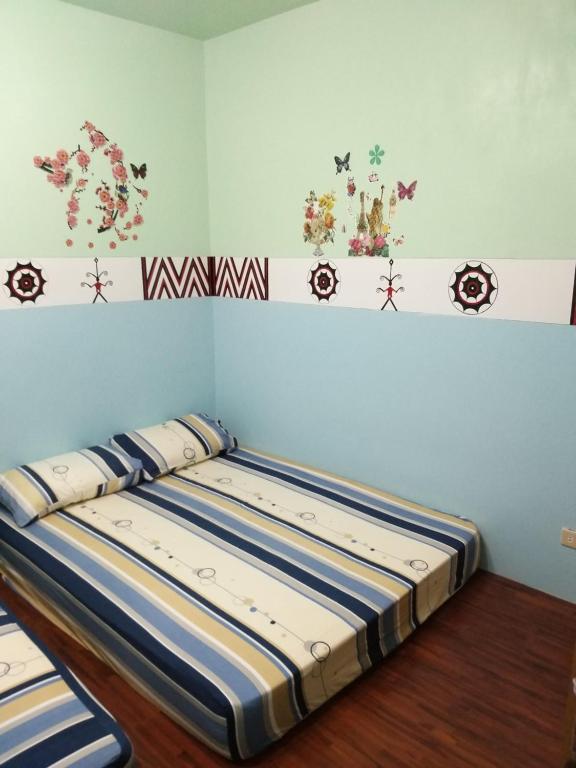 Postel nebo postele na pokoji v ubytování Fu Ya N B&B