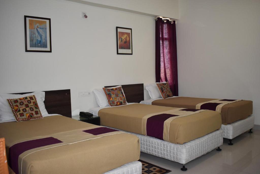 Hotel Bodh Vilas - Верхняя тройная комната