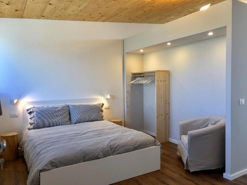 A bed or beds in a room at Casa A'Ispenza