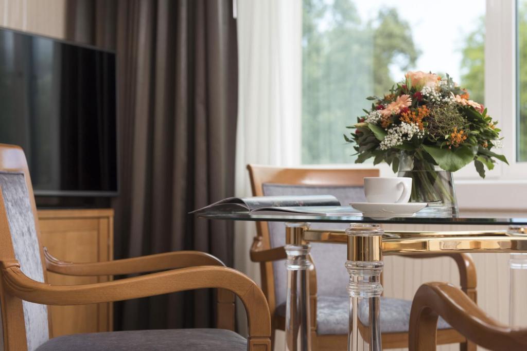 TV a/nebo společenská místnost v ubytování Maritim Hotel Stuttgart