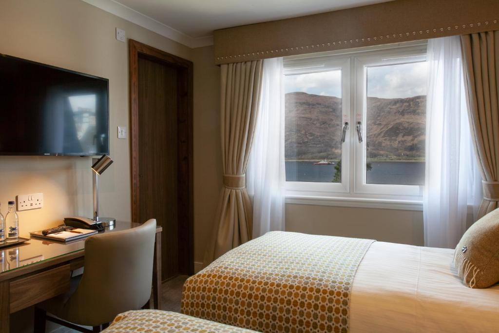 Postel nebo postele na pokoji v ubytování Cruachan Hotel