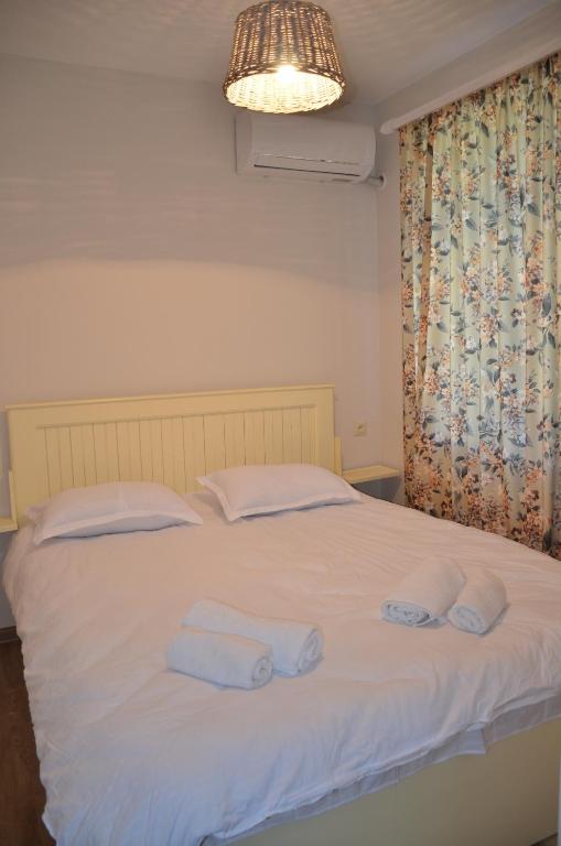 Postel nebo postele na pokoji v ubytování Mebo House