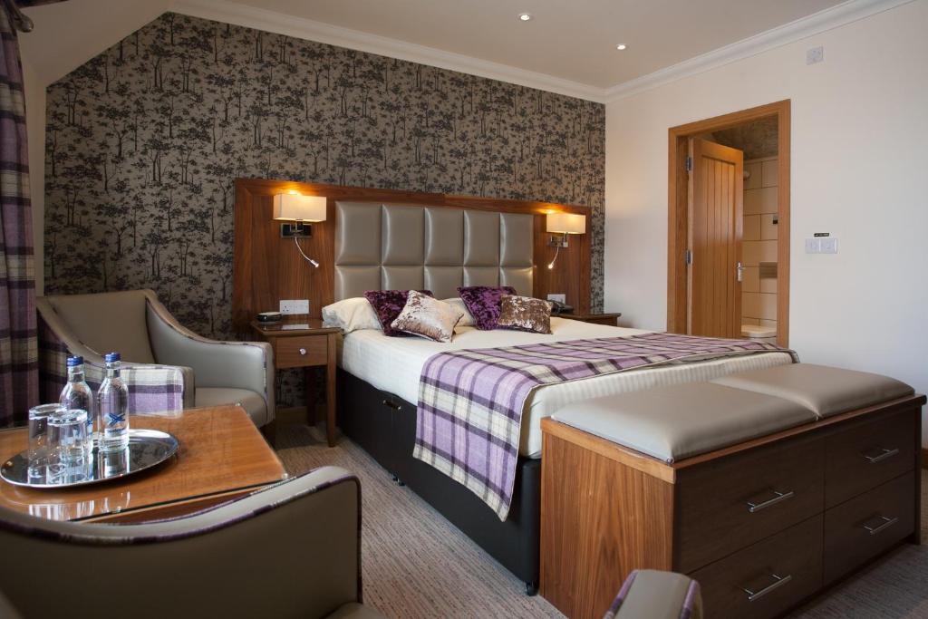 Postel nebo postele na pokoji v ubytování Cruachan Hotel