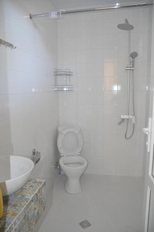Koupelna v ubytování Mebo House