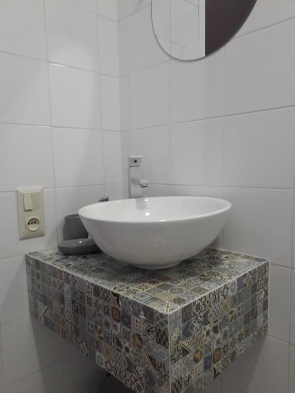 Koupelna v ubytování Mebo House