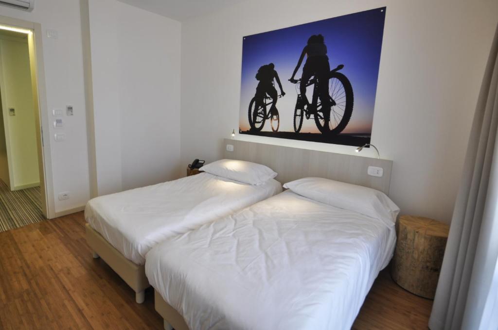 Łóżko lub łóżka w pokoju w obiekcie Energy Hotel
