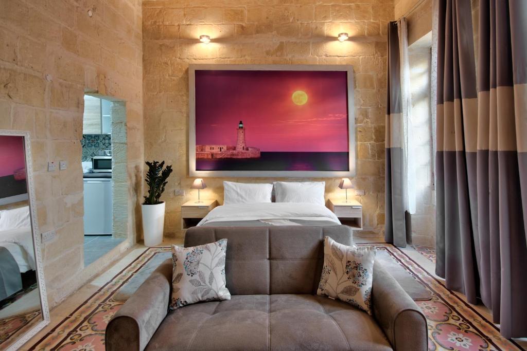 Postel nebo postele na pokoji v ubytování Laparelli Suites: Luxury Suite 3
