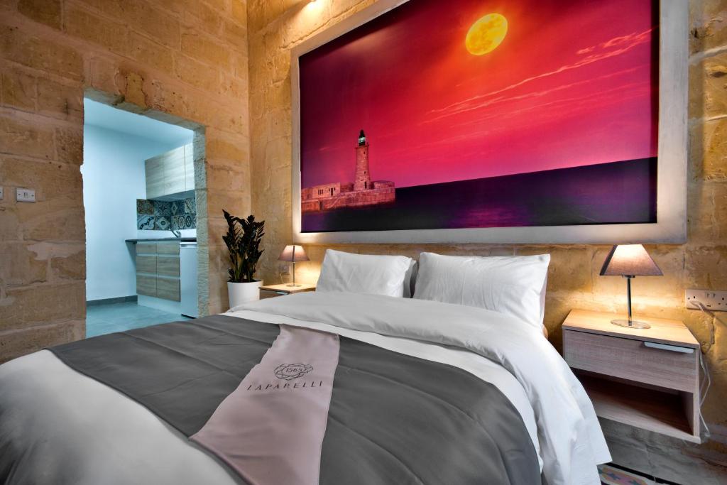Postel nebo postele na pokoji v ubytování Laparelli Suites: Luxury Suite 3