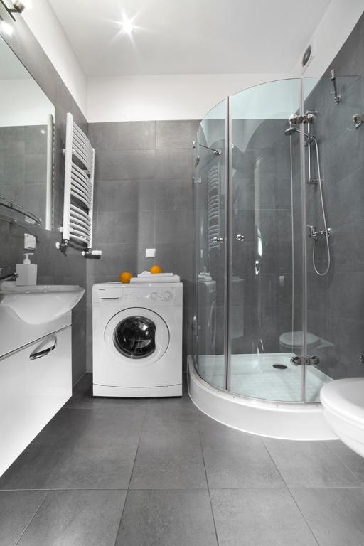 Kúpeľňa v ubytovaní Apartamenty Pomarańczarnia