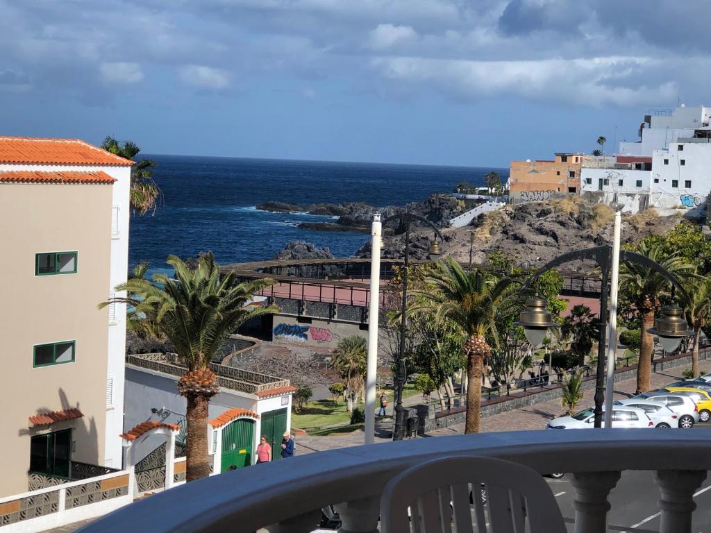a view of the ocean from a balcony at Apartment Playa la Arena in Puerto de Santiago