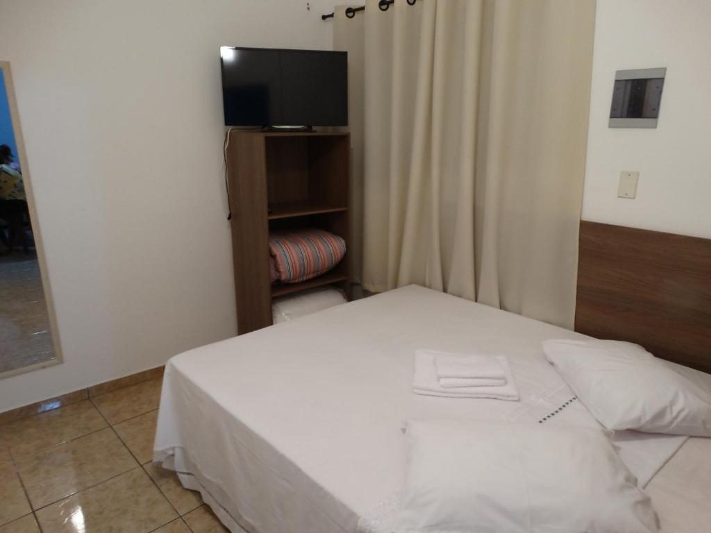 Postel nebo postele na pokoji v ubytování Practic Pousada