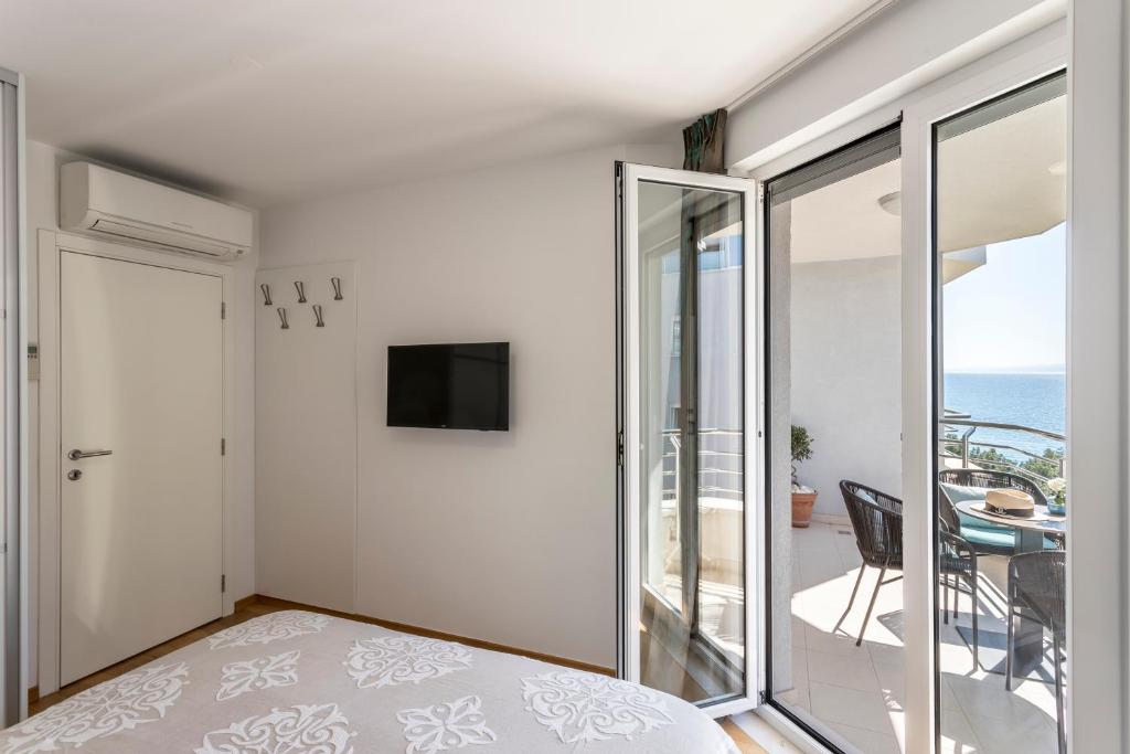 TV a/nebo společenská místnost v ubytování Adriatic Queen Rooms & Apartments