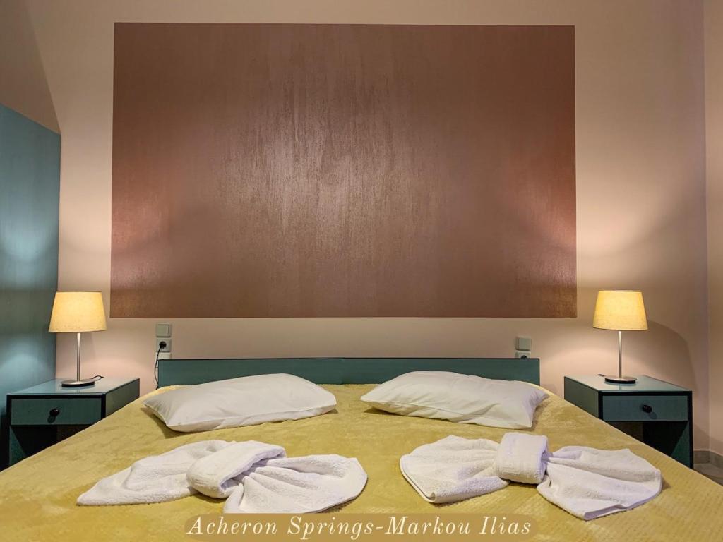 A bed or beds in a room at Acheron Springs-Markou Ilias