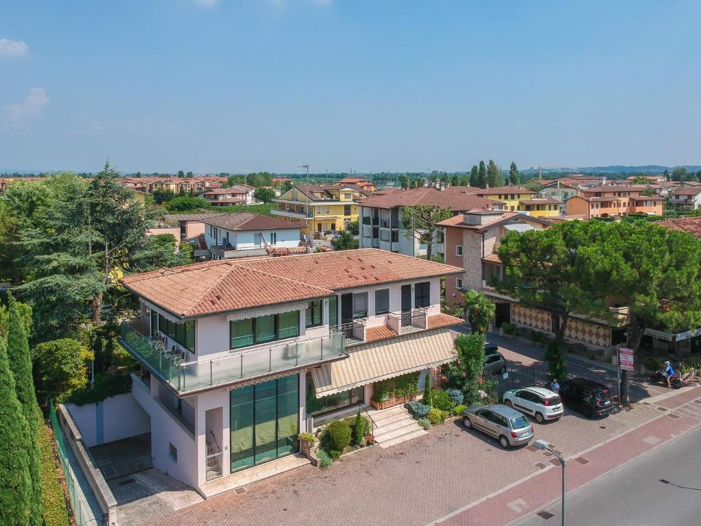 an aerial view of a house in a city at Appartamenti America in Sirmione