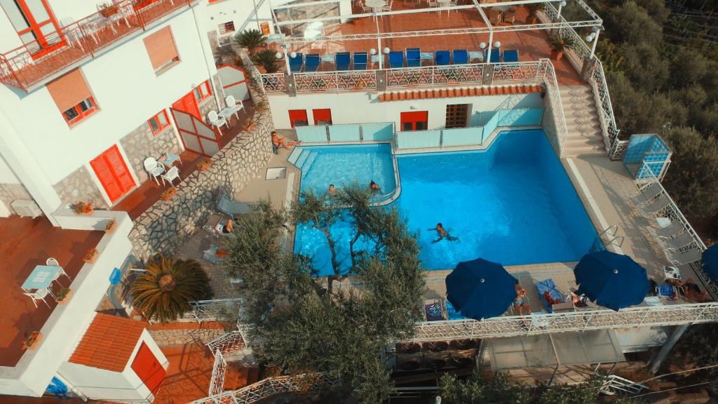 an overhead view of a swimming pool at a hotel at Hotel Dania in Sorrento