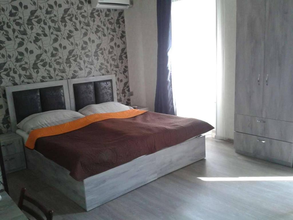 Postel nebo postele na pokoji v ubytování Guest house UTA