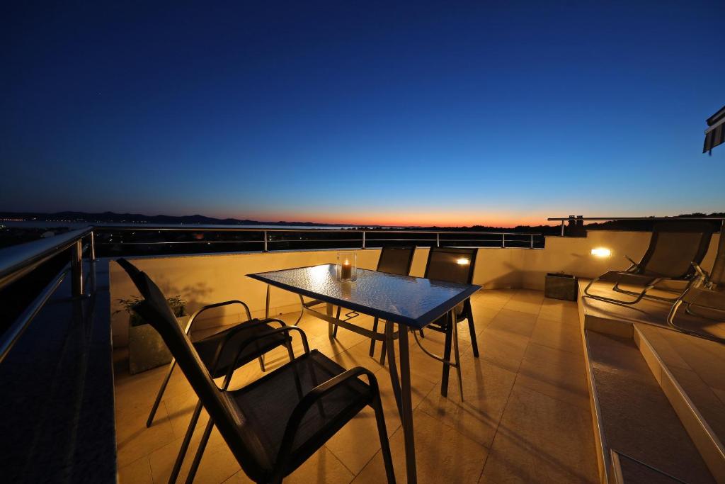 Balkón alebo terasa v ubytovaní Magic Blue Sky Apartment