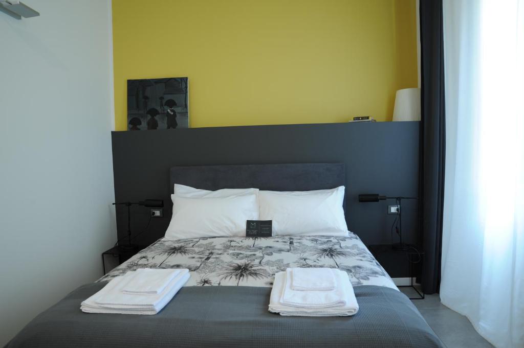 Postel nebo postele na pokoji v ubytování Milano Dreams
