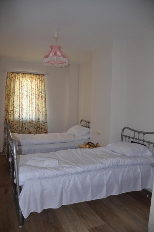Postel nebo postele na pokoji v ubytování Mebo House