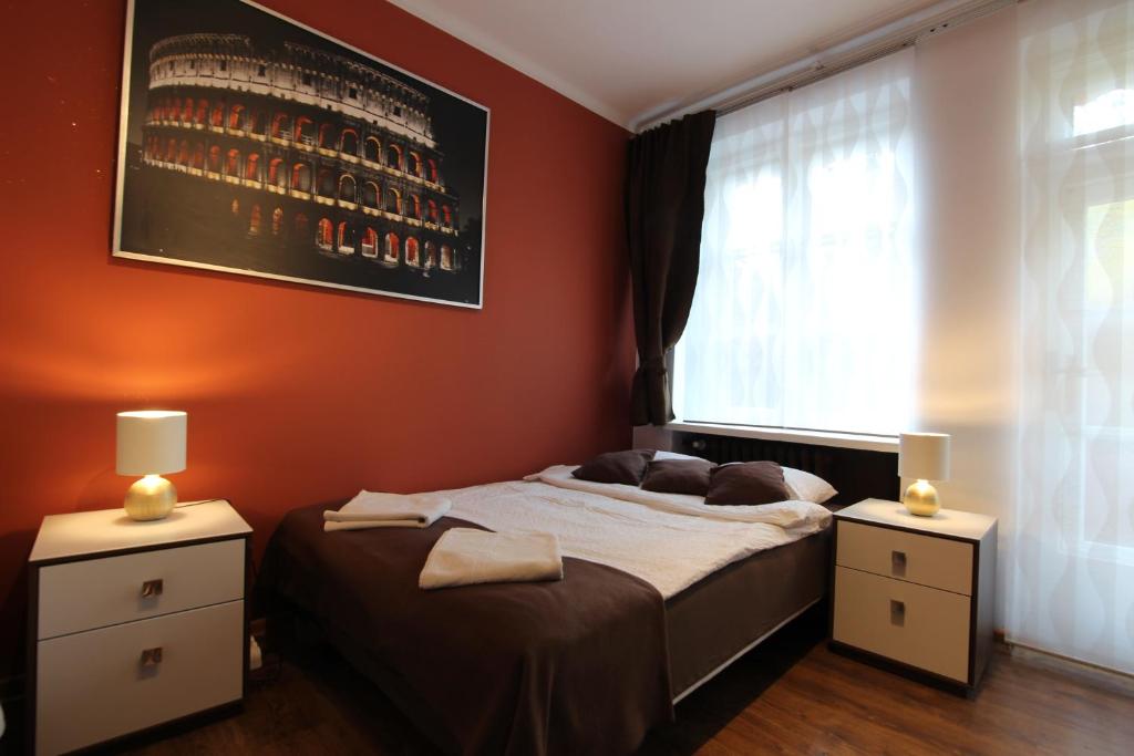 Posteľ alebo postele v izbe v ubytovaní Rainbow Apartments 1