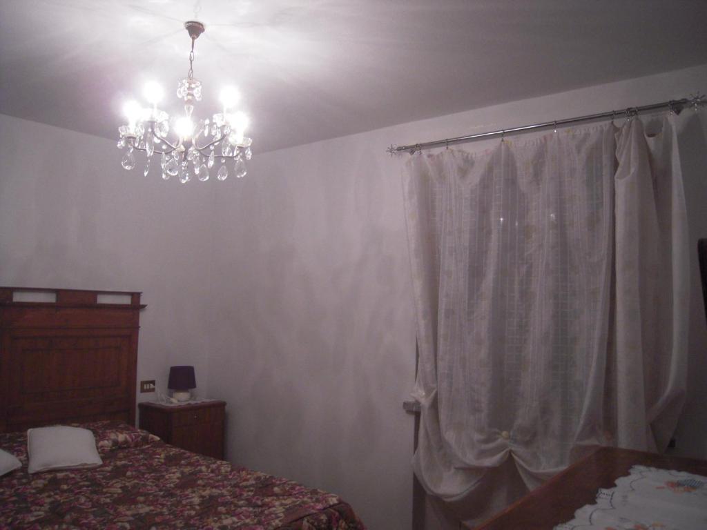 Postel nebo postele na pokoji v ubytování Uliveto