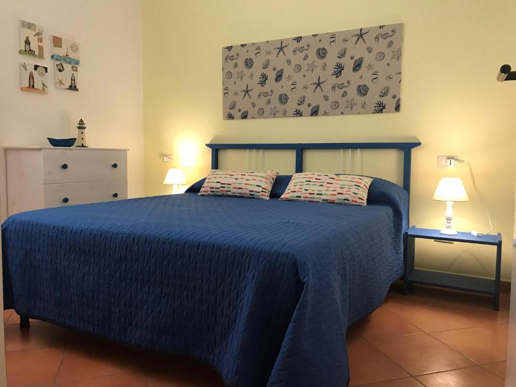 Postel nebo postele na pokoji v ubytování Appartamento Silva