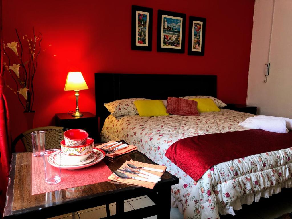 Cama o camas de una habitación en White House Peru