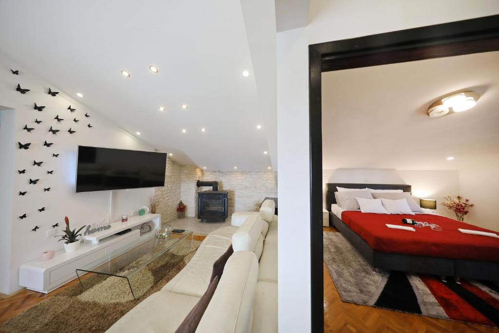 Posteľ alebo postele v izbe v ubytovaní Magic Blue Sky Apartment