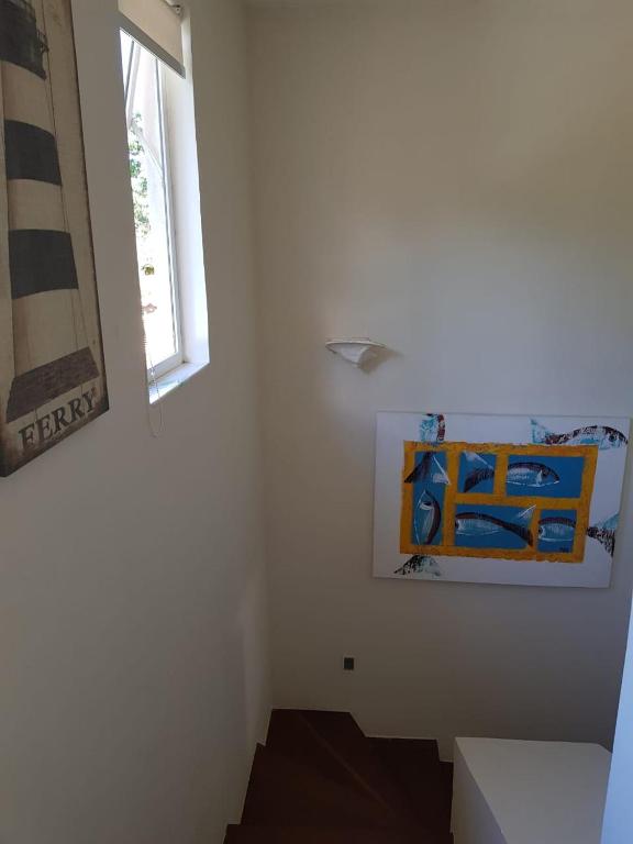  Casa alto padrão na Ferradura em condomínio com piscina privativa