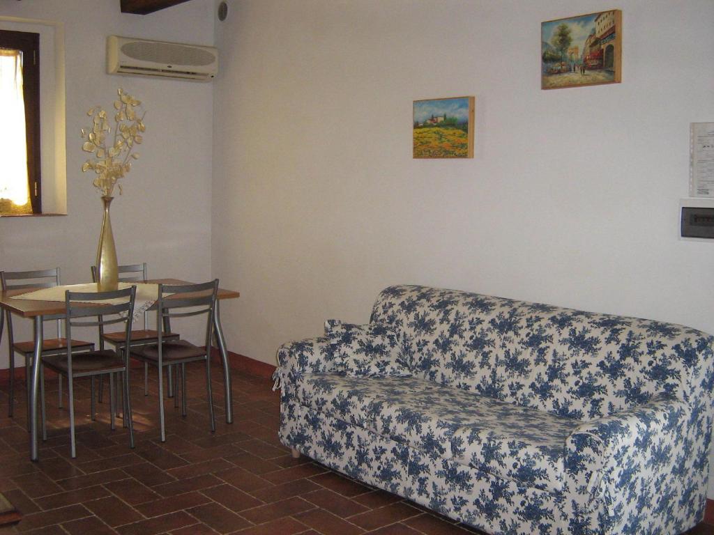 A bed or beds in a room at Certine Agriturismo