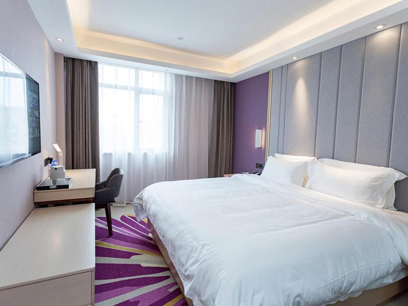 Voodi või voodid majutusasutuse Lavande Hotel (Yongxin Bubugao Times Square) toas