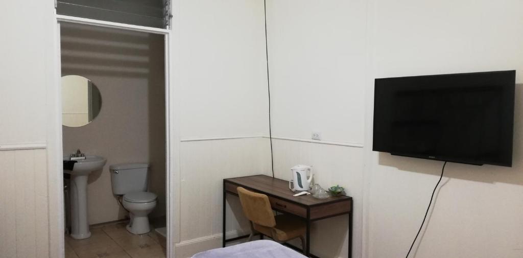 TV a/nebo společenská místnost v ubytování Casa Mayela Guest House