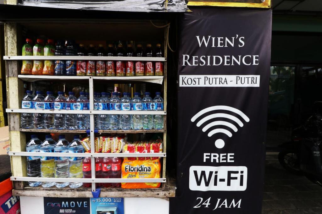 a store with a sign that reads whens residence not pump turn on drinks at Wiens Residence BSD in Tangerang