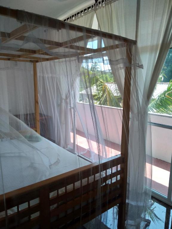 Postel nebo postele na pokoji v ubytování Mallika Resort