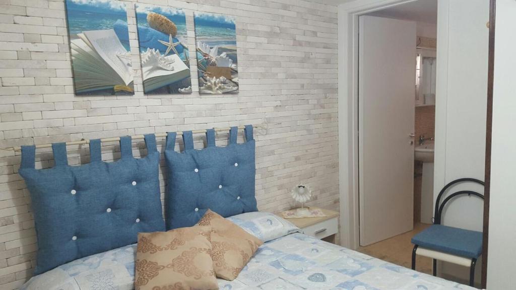 Postel nebo postele na pokoji v ubytování Baccaversa camere
