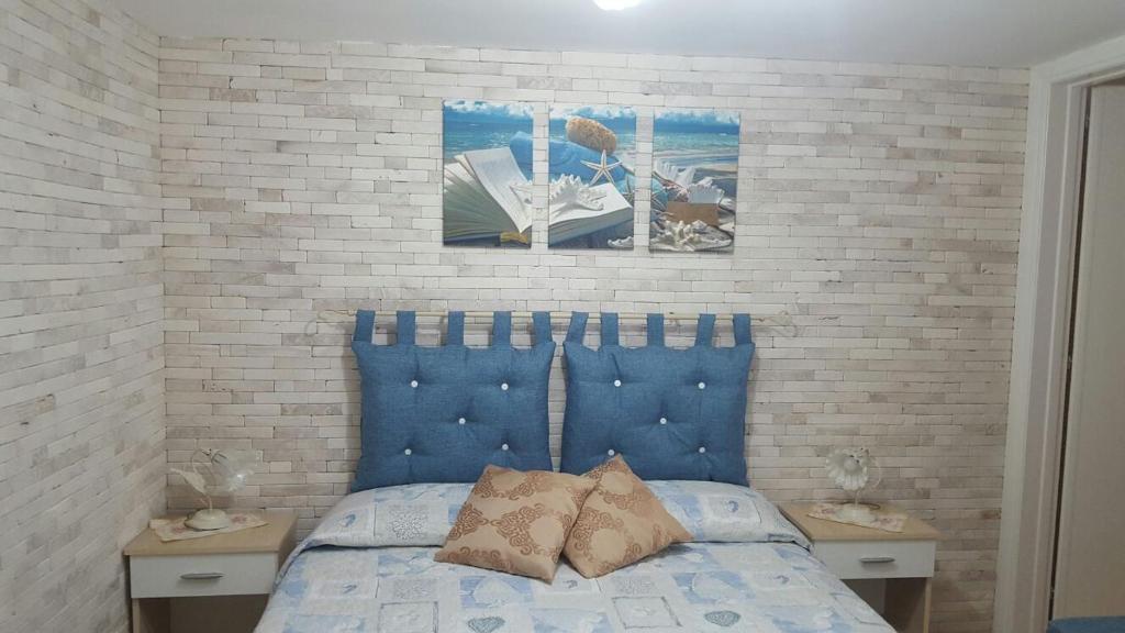 Postel nebo postele na pokoji v ubytování Baccaversa camere